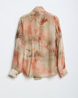 Blusa con cravatta H2O